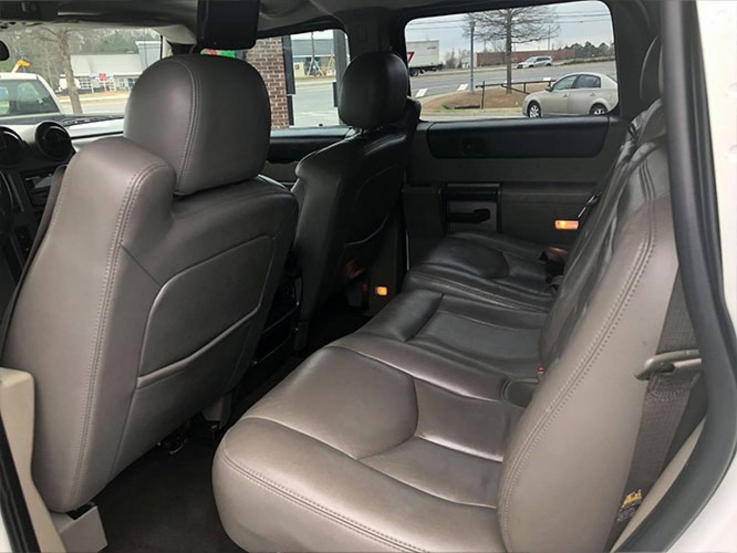 2004 Hummer H2 Sport Utility (5GRGN23U44H) with an 6.0L V8 OHV 16V engine, 4-Speed Automatic Overdrive transmission, located at 7710 Tara Blvd, Jonesboro, GA, 30236, (678) 450-1000, 33.544365, -84.367821 - Photo#11