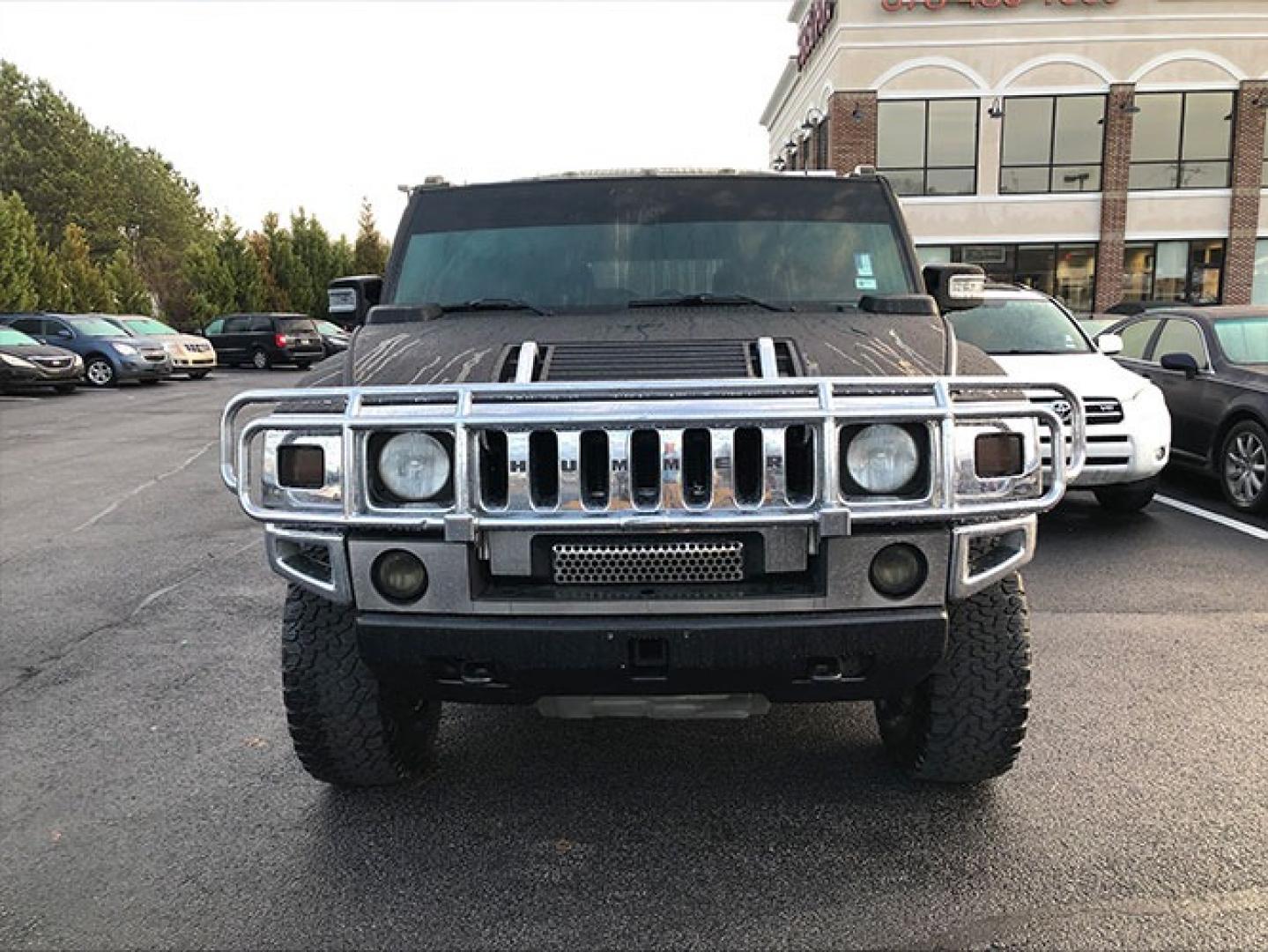 2007 Hummer H2 Adventure (5GRGN23UX7H) with an 6.0L V8 OHV 16V engine, 4-Speed Automatic Overdrive transmission, located at 7710 Tara Blvd, Jonesboro, GA, 30236, (678) 450-1000, 33.544365, -84.367821 - Photo#2