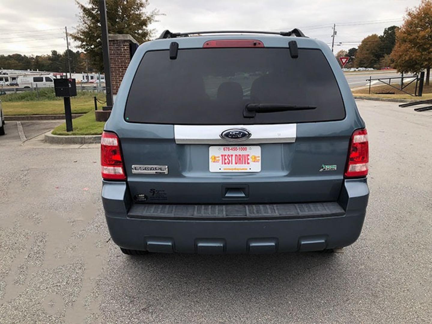 2010 Ford Escape Limited FWD (1FMCU0EG6AK) with an 3.0L V6 DOHC 24V engine, 6-Speed Automatic transmission, located at 7710 Tara Blvd, Jonesboro, GA, 30236, (678) 450-1000, 33.544365, -84.367821 - Photo#5