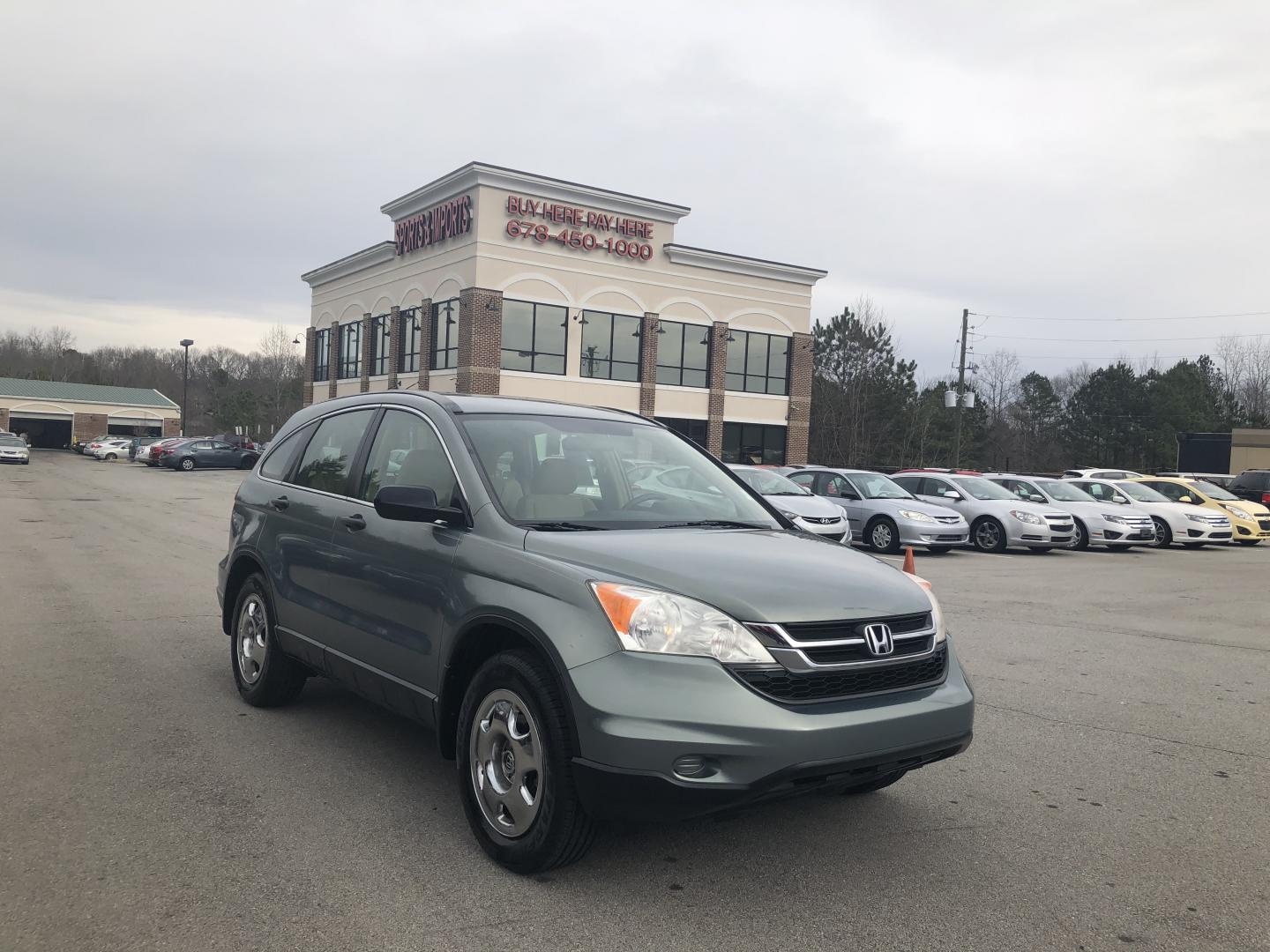 2010 Honda CR-V LX 2WD 5-Speed AT (JHLRE3H39AC) with an 2.4L L4 DOHC 16V engine, 5-Speed Automatic transmission, located at 6121 Memorial Drive, Stone Mountain, GA, 30083, (678) 450-1000, 33.804111, -84.191185 - Photo#0