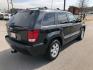 2010 Jeep Grand Cherokee Laredo 4WD (1J4PR4GK1AC) with an 3.7L V6 SOHC 12V engine, 5-Speed Automatic transmission, located at 7710 Tara Blvd, Jonesboro, GA, 30236, (678) 450-1000, 33.544365, -84.367821 - Photo#7