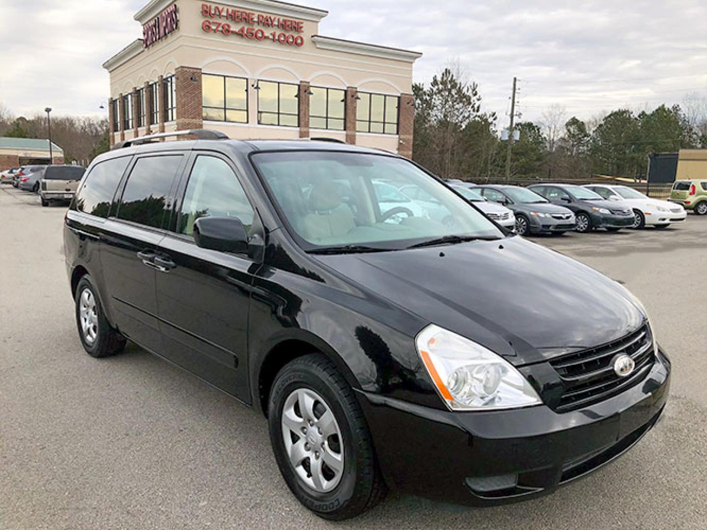 2010 Kia Sedona Base SWB (KNDMG4C34A6) with an 3.8L V6 DOHC 24V engine, 5-Speed Automatic transmission, located at 6121 Memorial Drive, Stone Mountain, GA, 30083, (678) 450-1000, 33.804111, -84.191185 - Photo#0