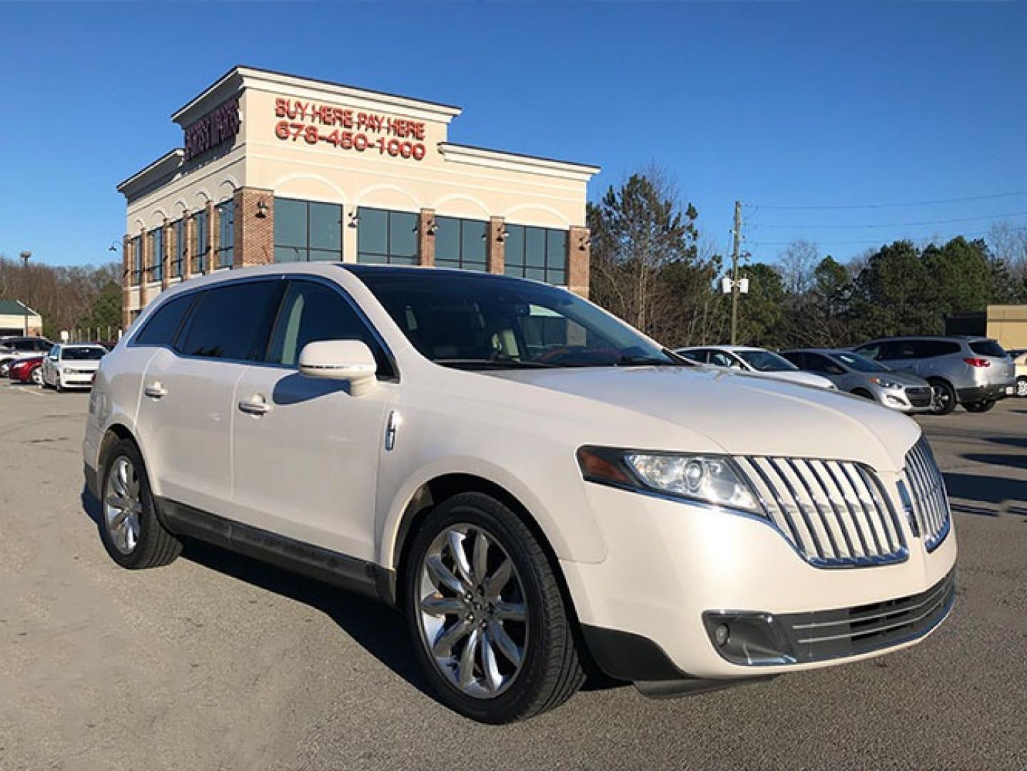 2010 Lincoln MKT FWD with an 3.7L V6 DOHC 24V engine, 6-Speed Automatic transmission, located at 6121 Memorial Drive, Stone Mountain, GA, 30083, (678) 450-1000, 33.804111, -84.191185 - Photo#0