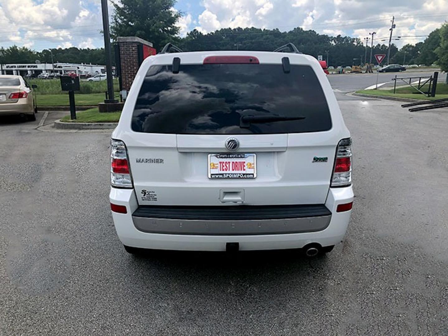 2010 Mercury Mariner V6 2WD (4M2CN8BG4AK) with an 3.0L V6 engine, 6-Speed Automatic transmission, located at 7710 Tara Blvd, Jonesboro, GA, 30236, (678) 450-1000, 33.544365, -84.367821 - Photo#5