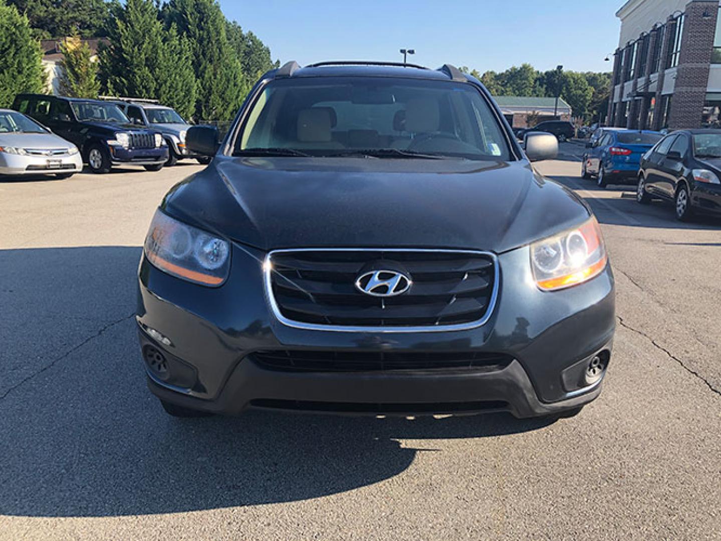 2011 Hyundai Santa Fe GL 2.4 FWD (5XYZG3AB6BG) with an 2.4L L4 DOHC 16V engine, 6-Speed Automatic transmission, located at 7710 Tara Blvd, Jonesboro, GA, 30236, (678) 450-1000, 33.544365, -84.367821 - Photo#1