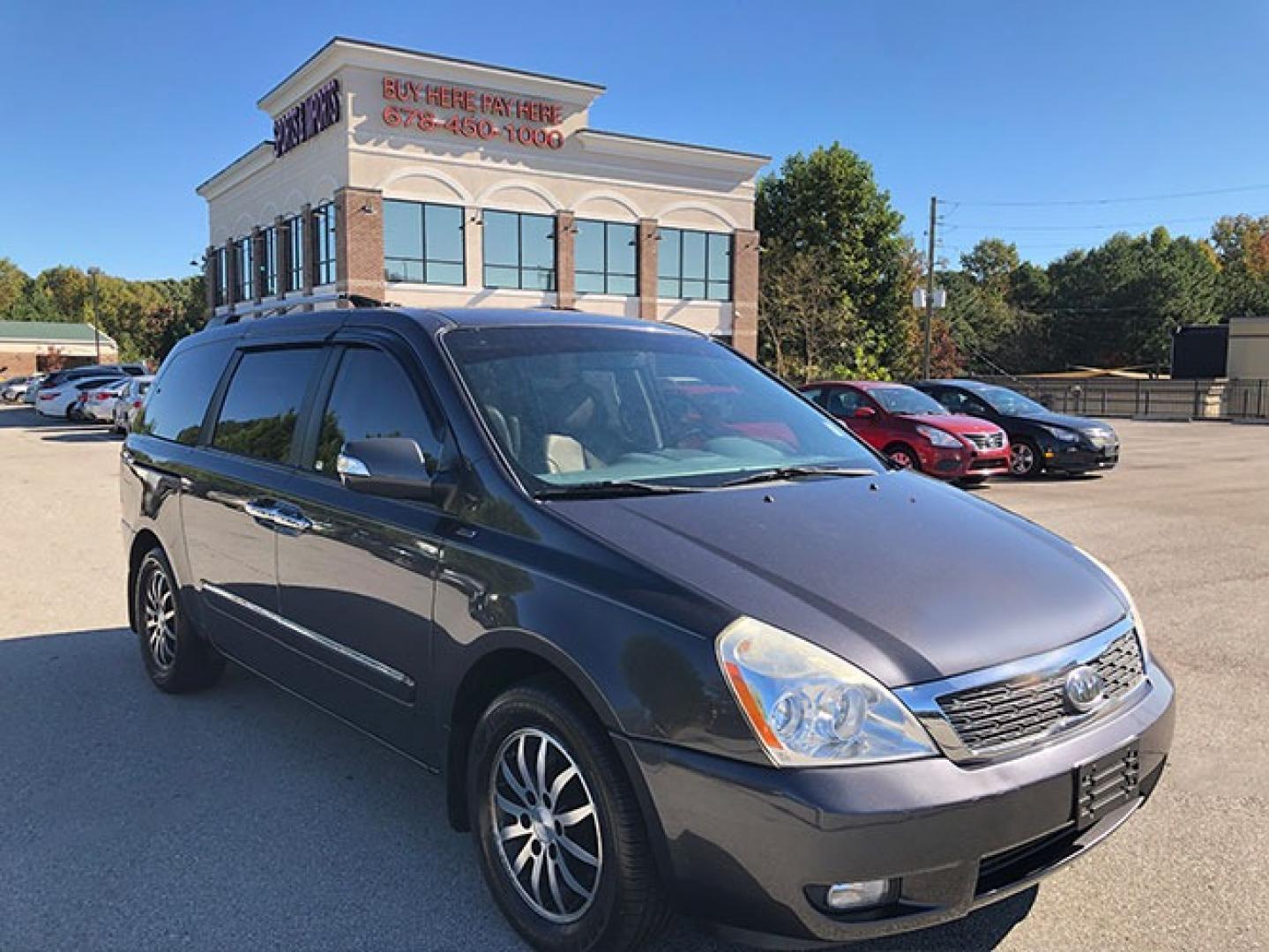 2012 Kia Sedona EX LWB (KNDMH4C72C6) with an 3.8L V6 DOHC 24V engine, 5-Speed Automatic transmission, located at 620 Jesse Jewell Pkwy, Gainesville, GA, 30501, (678) 450-1000, 34.305923, -83.809784 - Photo#0