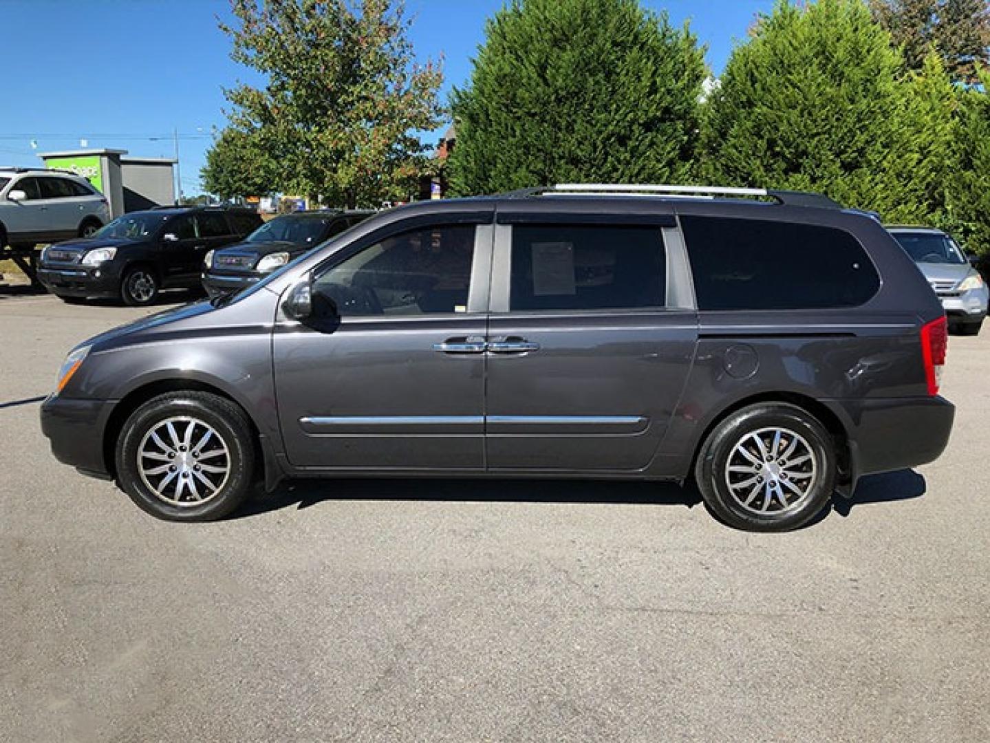 2012 Kia Sedona EX LWB (KNDMH4C72C6) with an 3.8L V6 DOHC 24V engine, 5-Speed Automatic transmission, located at 620 Jesse Jewell Pkwy, Gainesville, GA, 30501, (678) 450-1000, 34.305923, -83.809784 - Photo#3