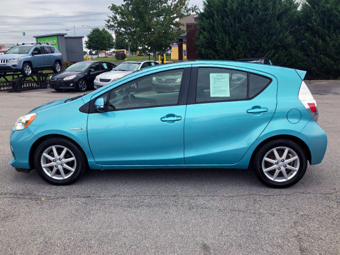 2012 Toyota Prius c One (JTDKDTB38C1) with an 1.5L L4 DOHC 16V HYBRID engine, Cvt transmission, located at 7710 Tara Blvd, Jonesboro, GA, 30236, (678) 450-1000, 33.544365, -84.367821 - Photo#3