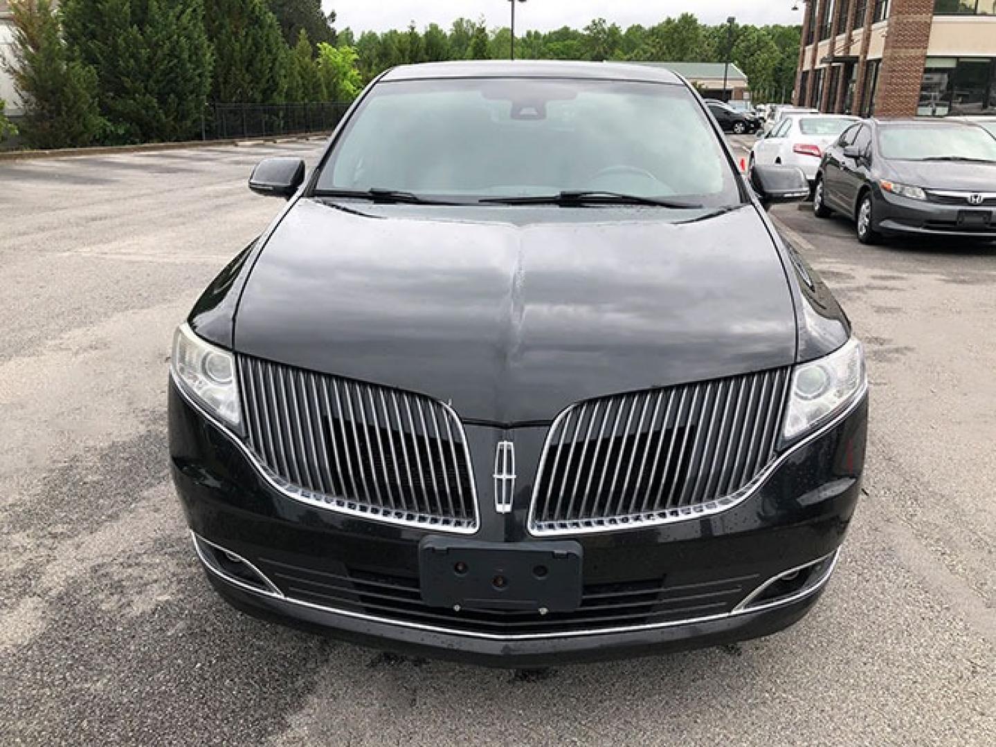 2013 Lincoln MKT Livery FWD (2LMGJ5M95DB) with an 2.0L L4 DOHC 16V engine, 6-Speed Automatic transmission, located at 7710 Tara Blvd, Jonesboro, GA, 30236, (678) 450-1000, 33.544365, -84.367821 - Photo#7