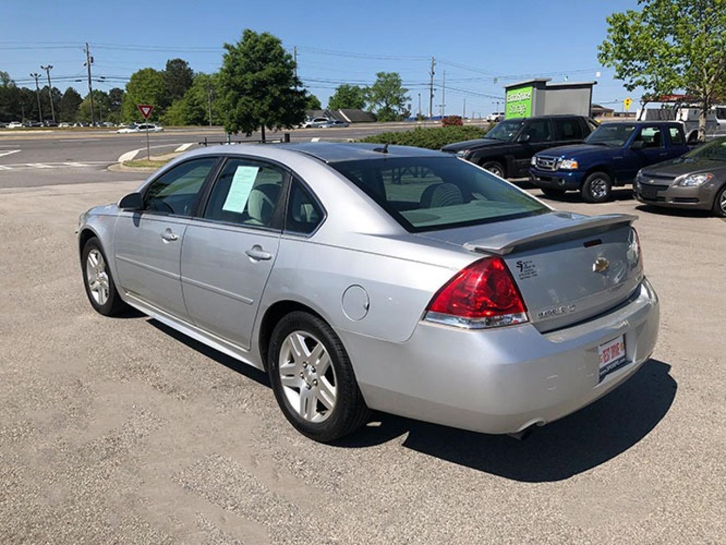 2014 Chevrolet Impala LT (2G1WB5E37E1) with an 3.6L V6 DOHC 16V FFV engine, 6-Speed Automatic transmission, located at 7710 Tara Blvd, Jonesboro, GA, 30236, (678) 450-1000, 33.544365, -84.367821 - Photo#2