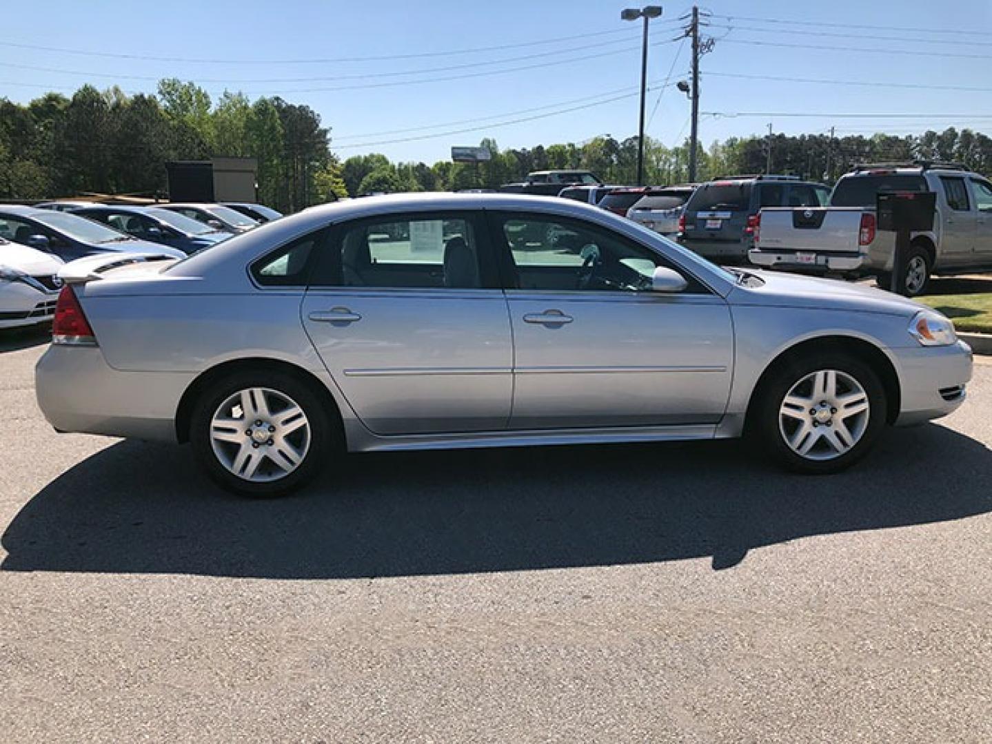 2014 Chevrolet Impala LT (2G1WB5E37E1) with an 3.6L V6 DOHC 16V FFV engine, 6-Speed Automatic transmission, located at 7710 Tara Blvd, Jonesboro, GA, 30236, (678) 450-1000, 33.544365, -84.367821 - Photo#5