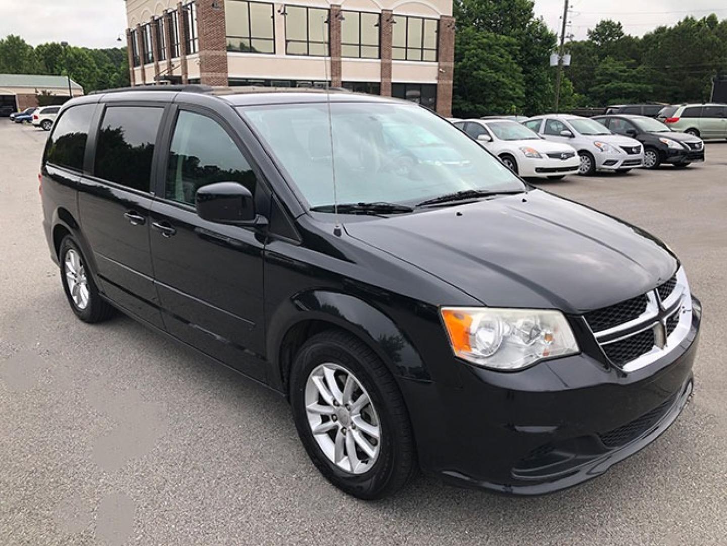 2014 Dodge Grand Caravan SXT (2C4RDGCG9ER) with an 3.6L V6 DOHC 24V engine, 6-Speed Automatic transmission, located at 7710 Tara Blvd, Jonesboro, GA, 30236, (678) 450-1000, 33.544365, -84.367821 - Photo#0