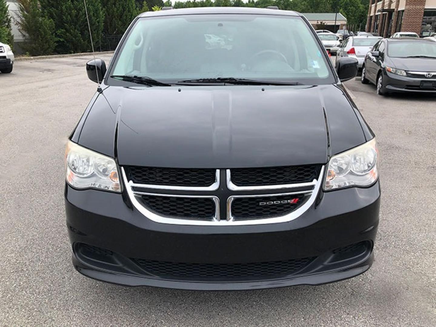 2014 Dodge Grand Caravan SXT (2C4RDGCG9ER) with an 3.6L V6 DOHC 24V engine, 6-Speed Automatic transmission, located at 7710 Tara Blvd, Jonesboro, GA, 30236, (678) 450-1000, 33.544365, -84.367821 - Photo#1