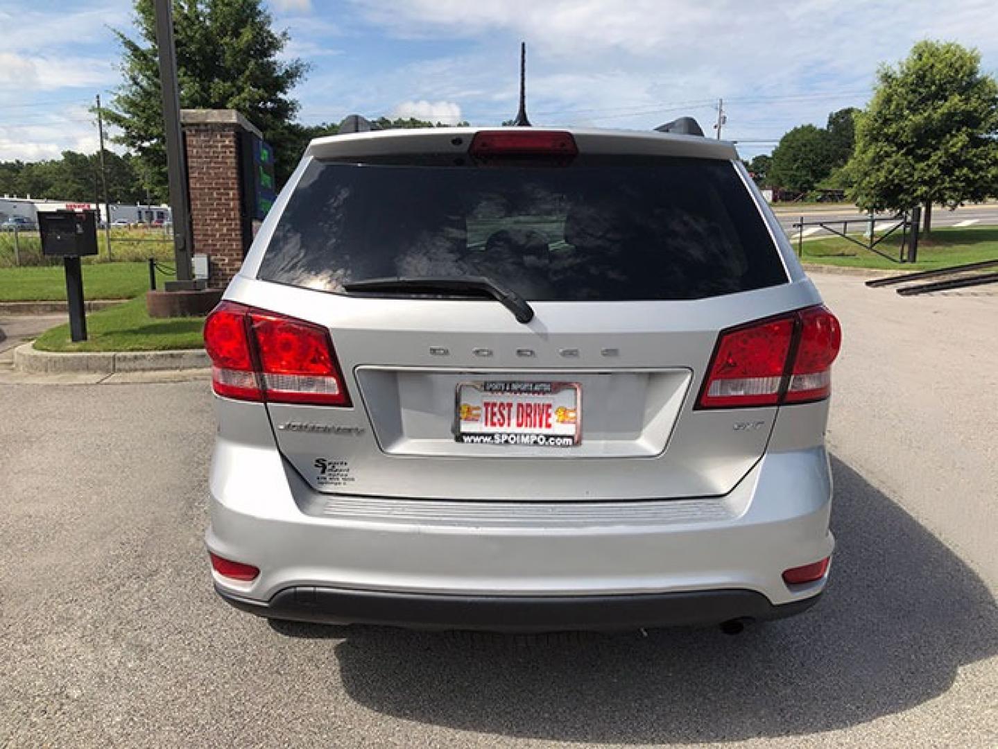 2014 Dodge Journey SXT (3C4PDCBB5ET) with an 2.4L L6 DOHC 16V engine, 4-Speed Automatic transmission, located at 7710 Tara Blvd, Jonesboro, GA, 30236, (678) 450-1000, 33.544365, -84.367821 - Photo#5