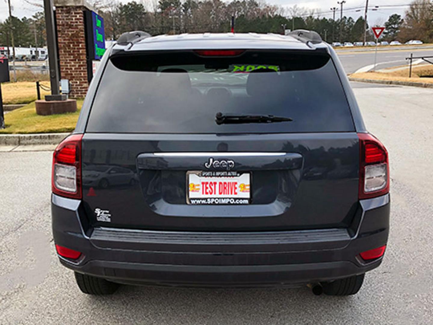 2014 Jeep Compass Sport FWD (1C4NJCBA4ED) with an 2.0L L4 DOHC 16V engine, located at 7710 Tara Blvd, Jonesboro, GA, 30236, (678) 450-1000, 33.544365, -84.367821 - Photo#5