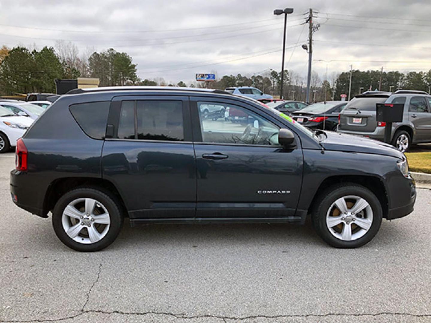 2014 Jeep Compass Sport FWD (1C4NJCBA4ED) with an 2.0L L4 DOHC 16V engine, located at 7710 Tara Blvd, Jonesboro, GA, 30236, (678) 450-1000, 33.544365, -84.367821 - Photo#7