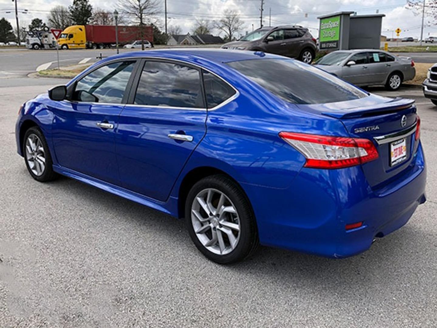 2014 Nissan Sentra S 6MT (3N1AB7AP7EY) with an 1.8L L4 SFI DOHC 16V engine, 6-Speed Manual transmission, located at 620 Jesse Jewell Pkwy, Gainesville, GA, 30501, (678) 450-1000, 34.305923, -83.809784 - Photo#4