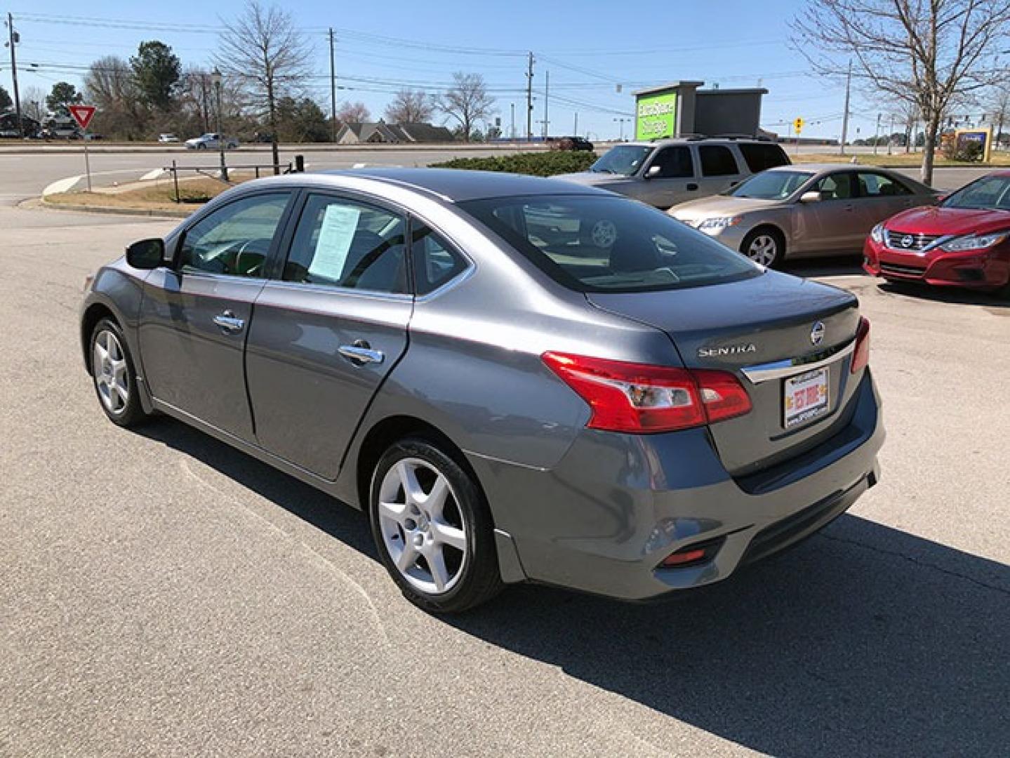 2016 Nissan Sentra FE+ S (3N1AB7APXGY) with an 1.8L L4 SFI DOHC 16V engine, CVT transmission, located at 7710 Tara Blvd, Jonesboro, GA, 30236, (678) 450-1000, 33.544365, -84.367821 - Photo#4