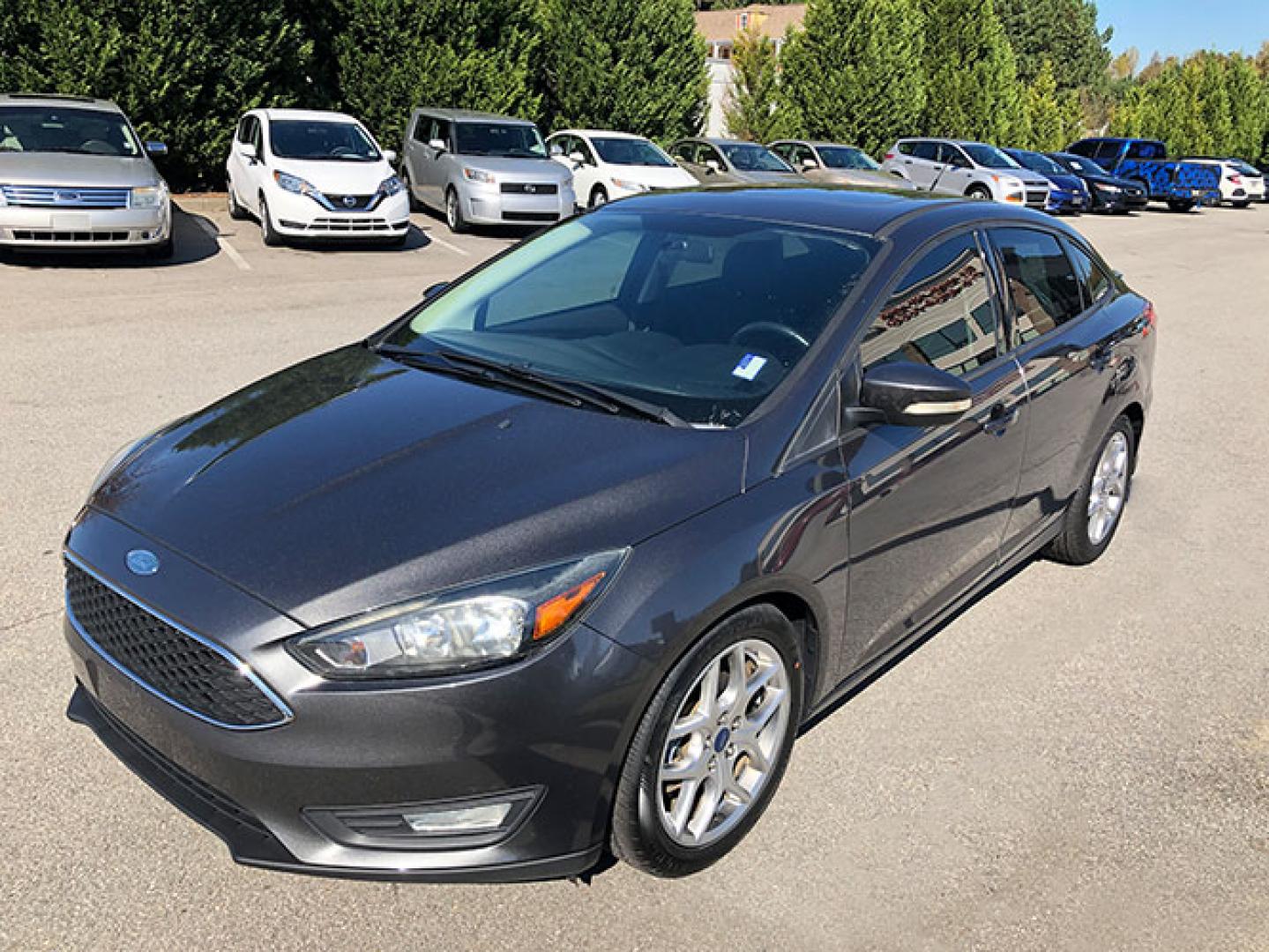 2015 Ford Focus SE Sedan (1FADP3F24FL) with an 2.0L L4 DOHC 16V engine, located at 620 Jesse Jewell Pkwy, Gainesville, GA, 30501, (678) 450-1000, 34.305923, -83.809784 - Photo#2