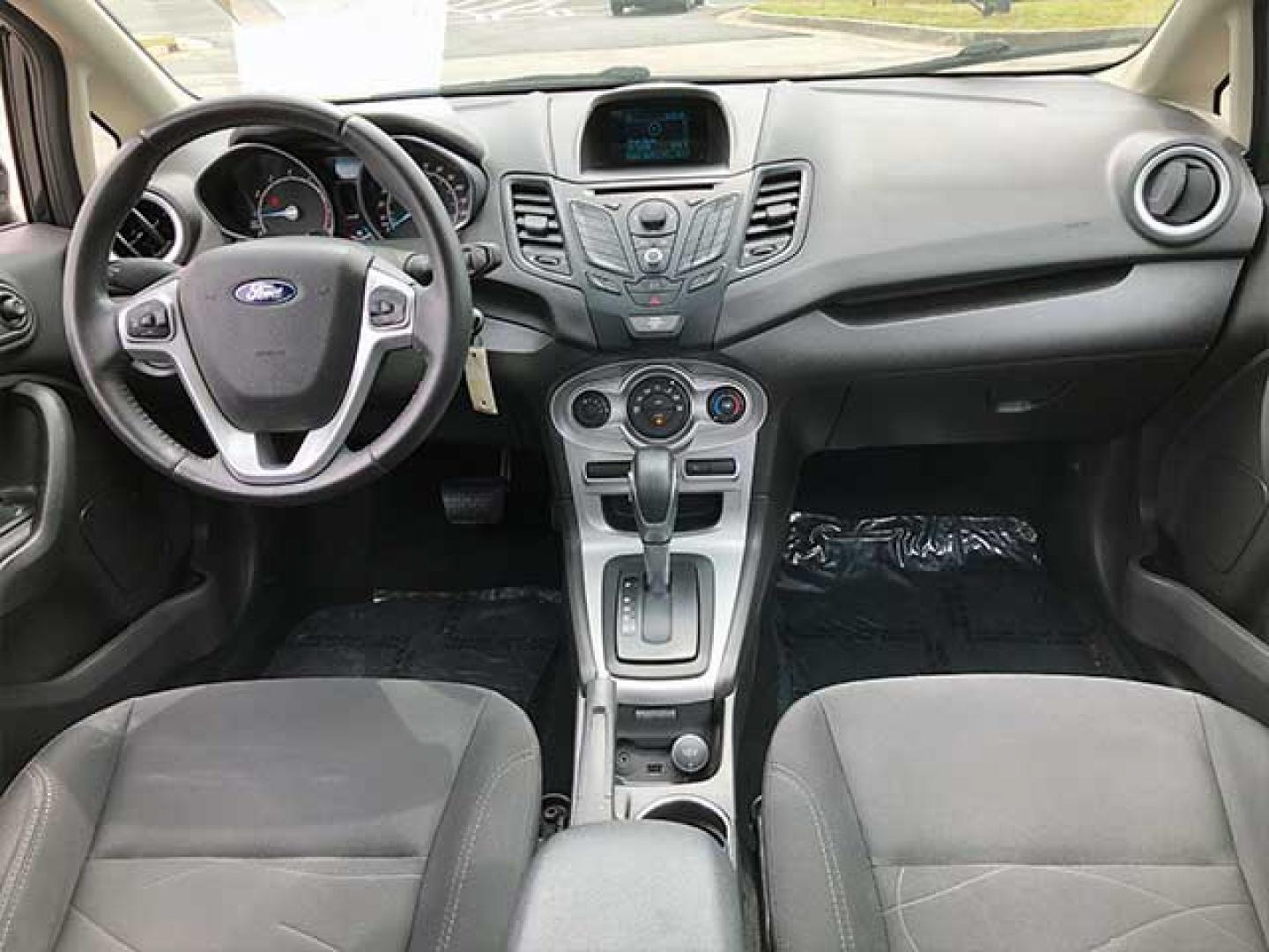 2014 Ford Fiesta SE Sedan (3FADP4BJ5EM) with an 1.6L L4 DOHC 16V engine, located at 7710 Tara Blvd, Jonesboro, GA, 30236, (678) 450-1000, 33.544365, -84.367821 - At Sports and Imports we'll get you approved for an auto loan right here, whatever your credit! Our buy here, pay here financing means you only need a driver's license and proof of income. Call us at 678-450-1000 for more information and get you driving today! LOW DOWN PAYMENT ($799) We match yo - Photo#6