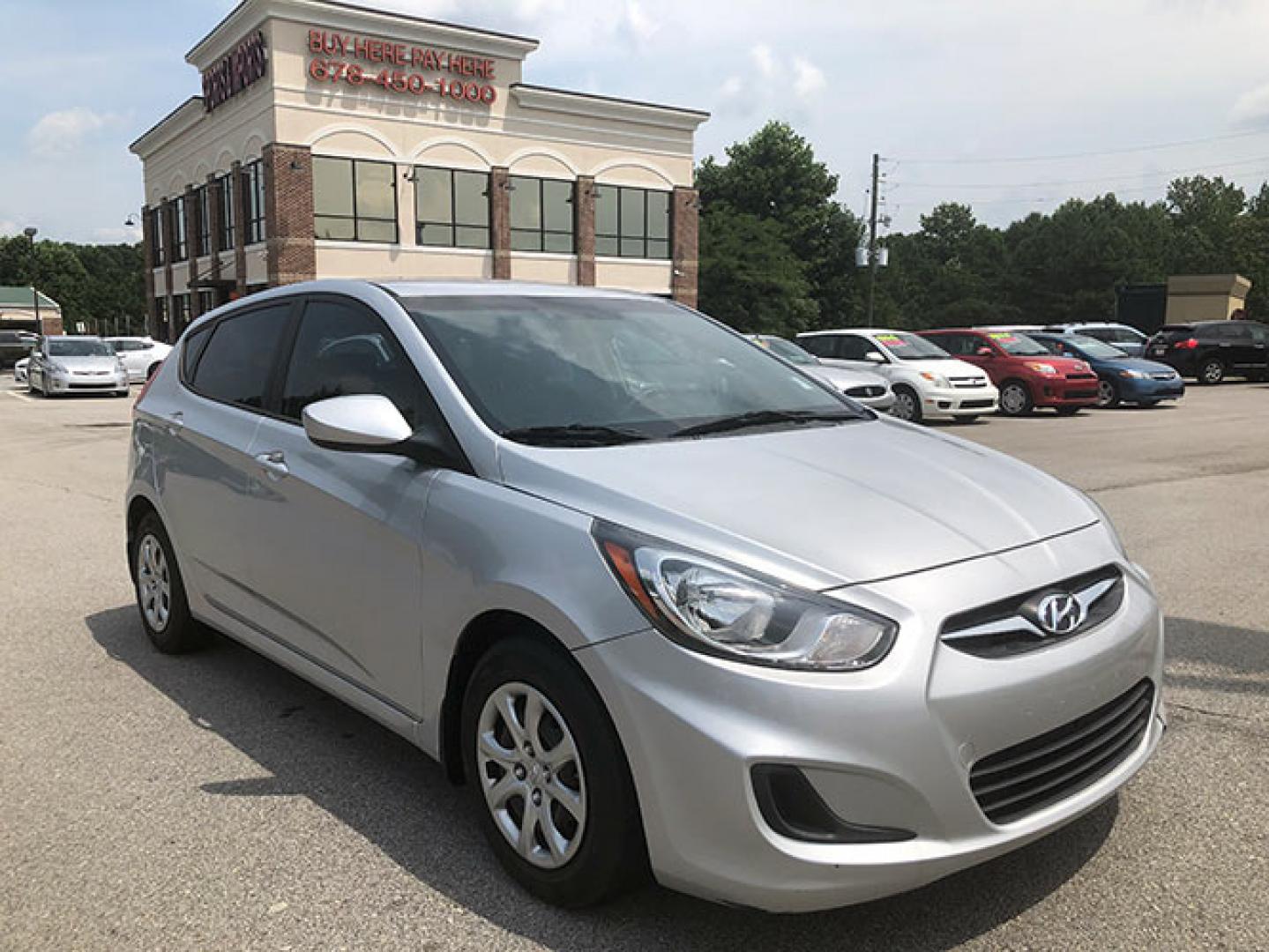 2014 Hyundai Accent GS 5-Door (KMHCT5AE8EU) with an 1.6L L4 DOHC 16V engine, located at 620 Jesse Jewell Pkwy, Gainesville, GA, 30501, (678) 450-1000, 34.305923, -83.809784 - Photo#0