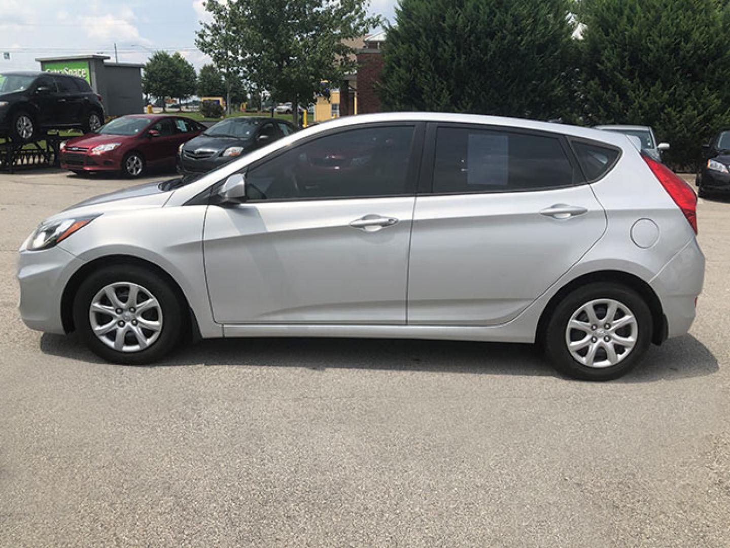 2014 Hyundai Accent GS 5-Door (KMHCT5AE8EU) with an 1.6L L4 DOHC 16V engine, located at 620 Jesse Jewell Pkwy, Gainesville, GA, 30501, (678) 450-1000, 34.305923, -83.809784 - Photo#3