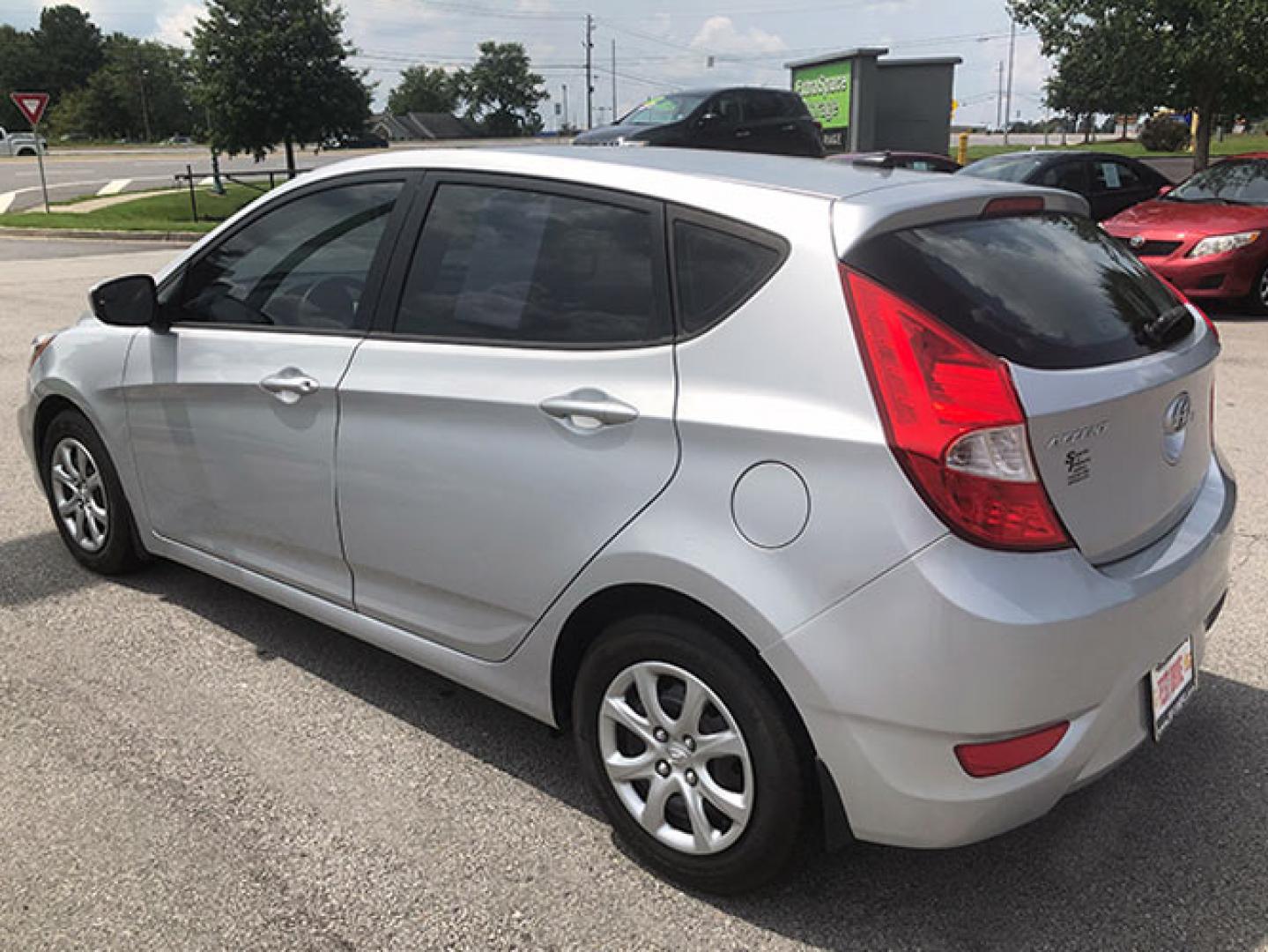 2014 Hyundai Accent GS 5-Door (KMHCT5AE8EU) with an 1.6L L4 DOHC 16V engine, located at 620 Jesse Jewell Pkwy, Gainesville, GA, 30501, (678) 450-1000, 34.305923, -83.809784 - Photo#4