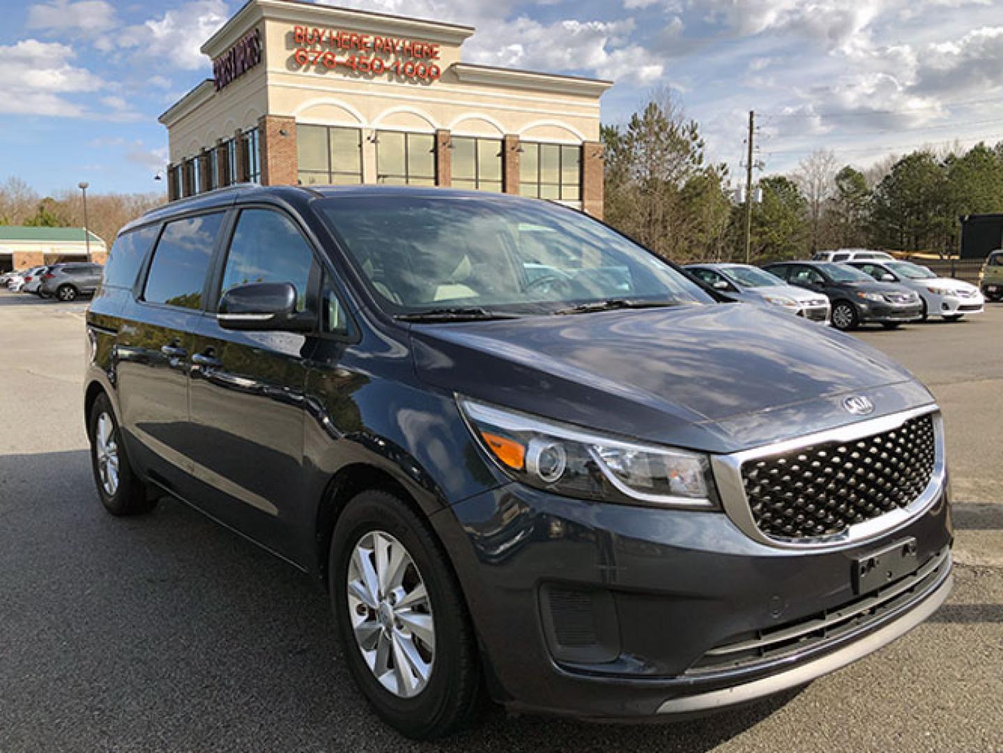 2015 Kia Sedona LX (KNDMB5C13F6) with an 3.3L V6 DOHC 24V engine, 6-Speed Automatic transmission, located at 7710 Tara Blvd, Jonesboro, GA, 30236, (678) 450-1000, 33.544365, -84.367821 - Photo#0